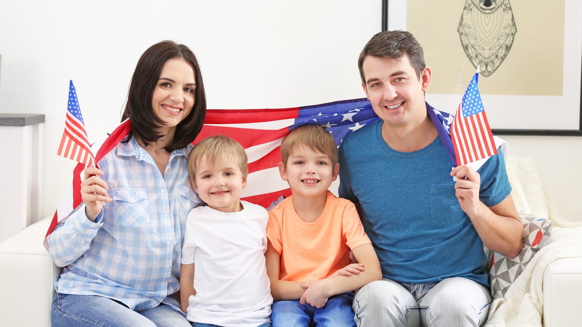 Family holding American flags