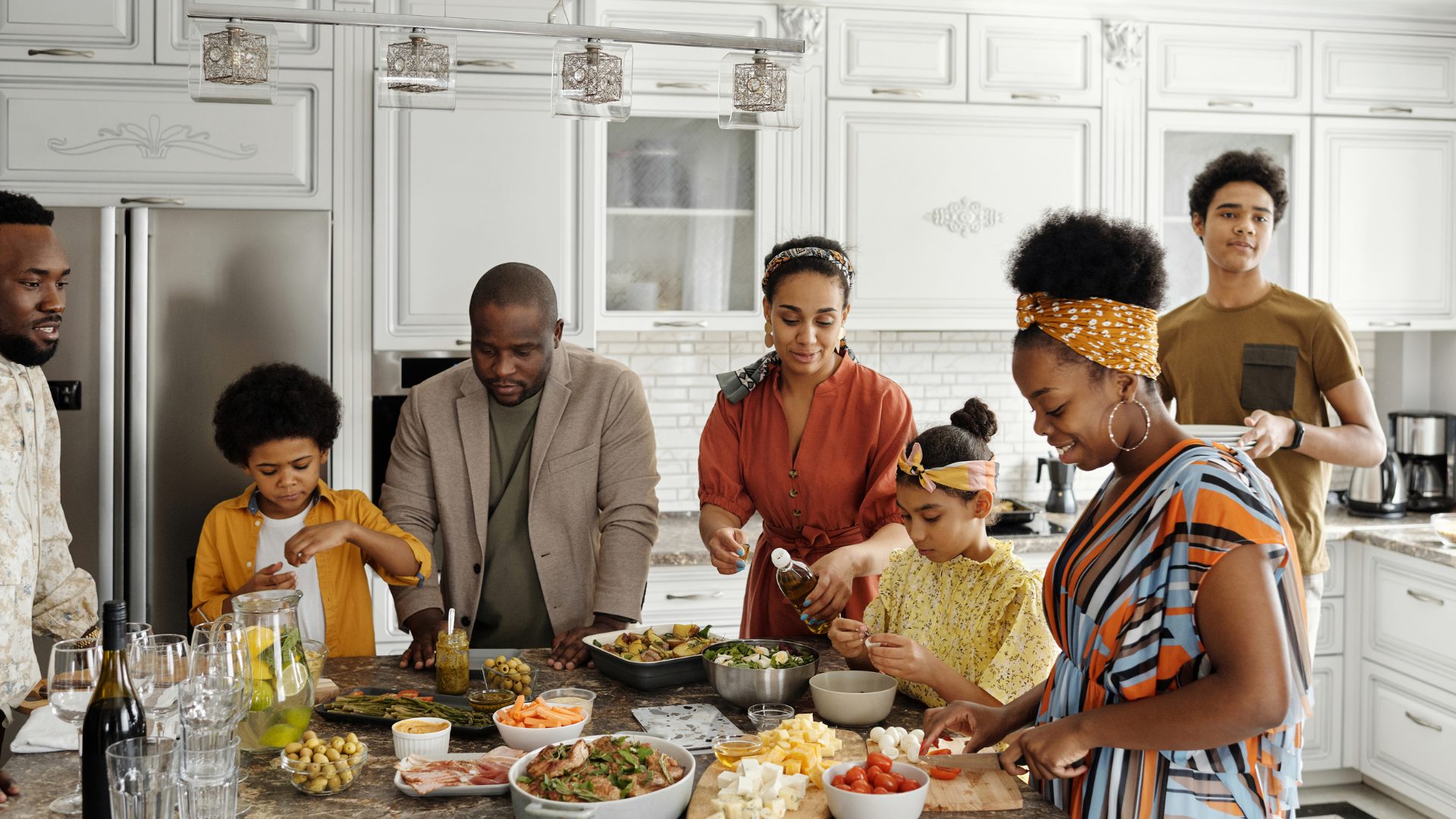 Family cooking together in the kitchen