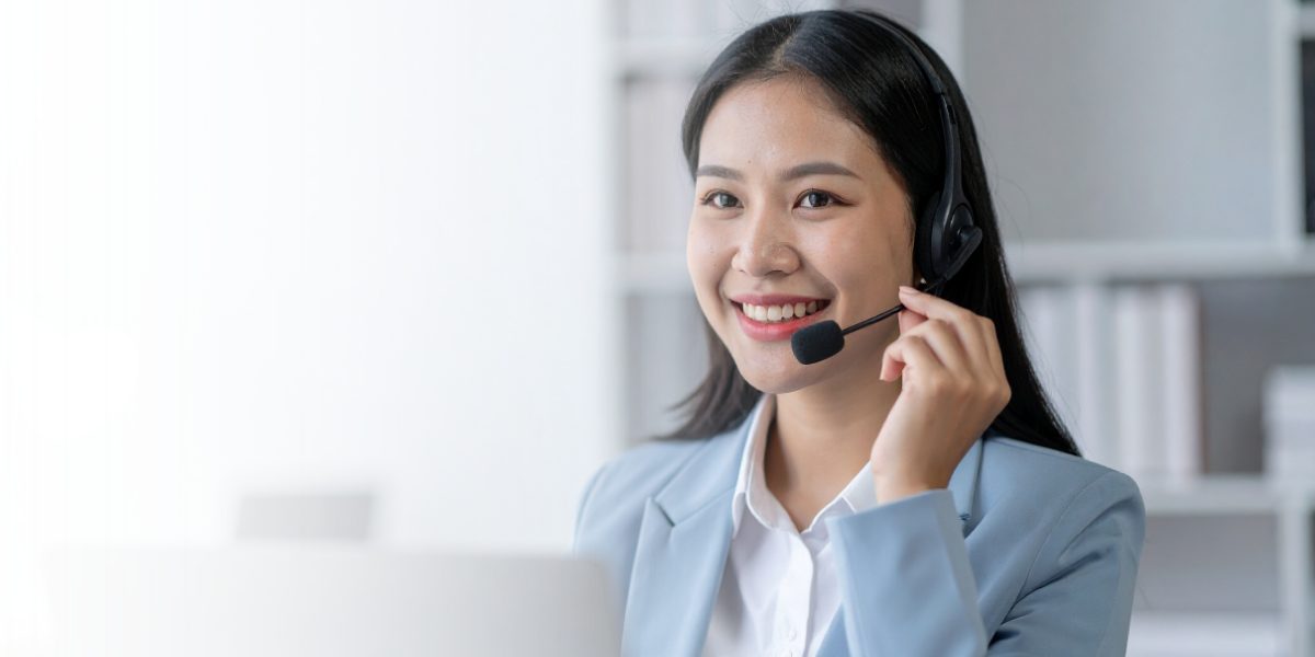 Care Hub agent answering an after-hours call with a headset