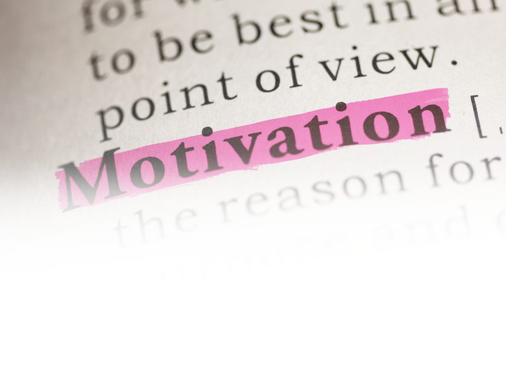 The word Motivation highlighted in a dictionary