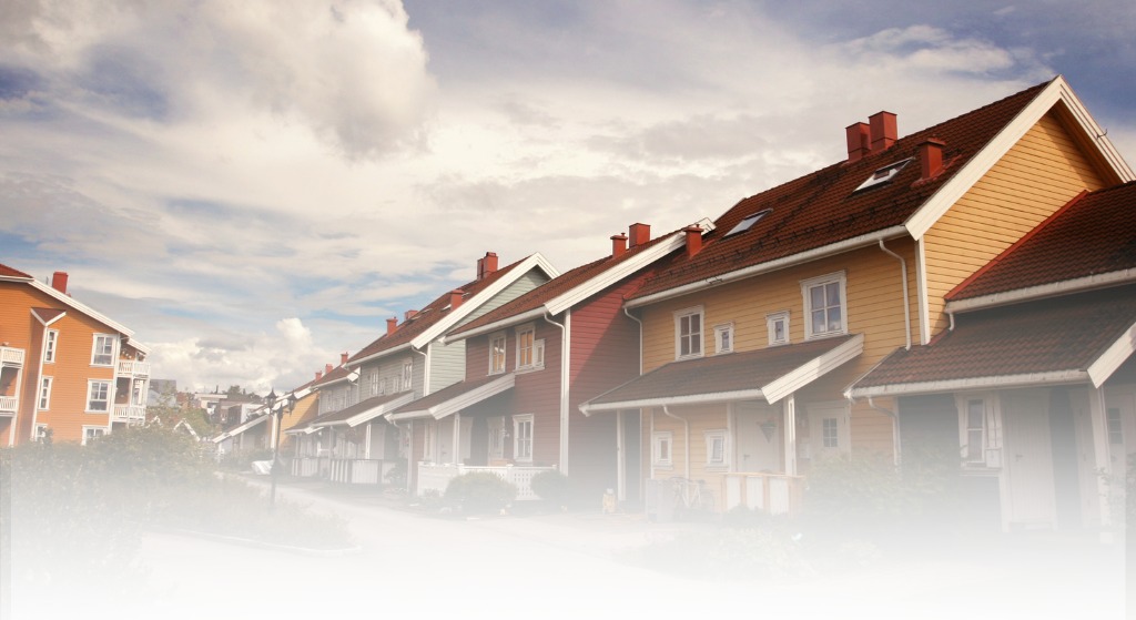 Row of houses in a U.S. neighborhood representing concierge relocation support