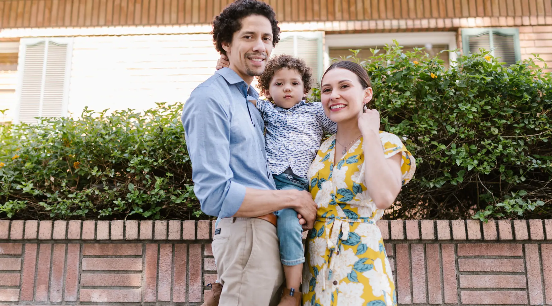 A family together outside their home in the United States