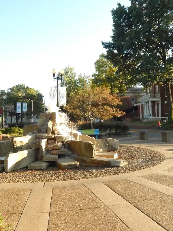 A plaza with a fountain in the Haynies Corner Arts District